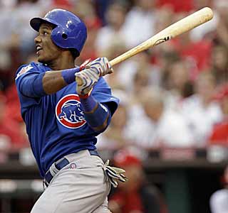 Starlin Castro hits a homer in his first major league at-bat on his way to a record day. (AP)