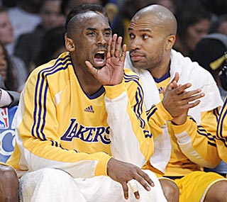 With the game well in hand, Kobe Bryant gets to spend plenty of time cheering on Los Angeles' reserves from the bench.