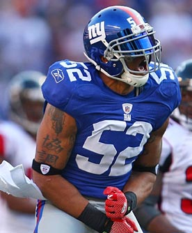 Michael Boley could use some good company in the linebacker corps. (Getty Images)