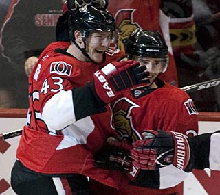 Peter Regin (left) and Ryan Shannon play big roles in Ottawa's win over one of the league's best teams.  (AP)